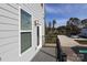 Private deck with metal railing overlooking parking area at 5004 Rill Ct # 37, Charlotte, NC 28262