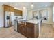 Modern kitchen with stainless steel appliances and island at 5004 Rill Ct # 37, Charlotte, NC 28262