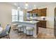Modern kitchen with island and breakfast bar seating at 5004 Rill Ct # 37, Charlotte, NC 28262