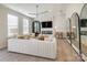 Bright living room with a large sofa and stylish decor at 5004 Rill Ct # 37, Charlotte, NC 28262