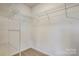 Large walk-in closet with wire shelving provides excellent storage at 5004 Rill Ct # 37, Charlotte, NC 28262
