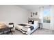 Bright bedroom with a comfortable bed, workspace, and natural light at 5067 Beargrass Dr, Dallas, NC 28034