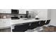Modern kitchen with an island and stainless steel appliances at 5067 Beargrass Dr, Dallas, NC 28034