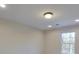 Spacious bedroom with large window and recessed lighting at 5528 Brickstone Dr, Charlotte, NC 28227