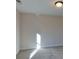 Light-filled bedroom featuring a window and carpeted floor at 5528 Brickstone Dr, Charlotte, NC 28227