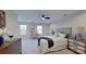 Spacious bedroom with carpeted floor, large windows, and plenty of natural light at 5528 Brickstone Dr, Charlotte, NC 28227