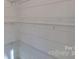 Walk-in pantry with wire shelving; offers ample storage space at 5528 Brickstone Dr, Charlotte, NC 28227