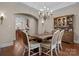 Bright dining room with a view into the kitchen at 574 Barber Loop, Mooresville, NC 28117