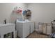 Laundry room with washer, dryer, and utility sink at 574 Barber Loop, Mooresville, NC 28117