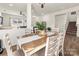 Bright dining room with wood table and chairs, adjacent to kitchen at 651 Ravina Ct, York, SC 29745