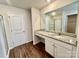 Main bathroom with a large vanity and shower at 8112 Derby Woods Ln, Charlotte, NC 28214