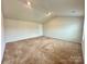 Spacious bedroom with neutral walls and carpet at 8112 Derby Woods Ln, Charlotte, NC 28214