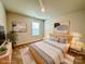 Virtually staged bedroom with a queen-size bed at 8112 Derby Woods Ln, Charlotte, NC 28214