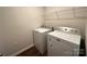 Laundry room with washer and dryer at 8112 Derby Woods Ln, Charlotte, NC 28214