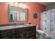 Bathroom with dark wood vanity, granite countertop, and shower/tub combo at 8176 Viscount Ct, Denver, NC 28037