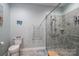 Bathroom with walk-in shower, tile flooring, and heated towel rack at 8176 Viscount Ct, Denver, NC 28037