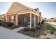 Brick ranch home with screened porch and landscaping at 8176 Viscount Ct, Denver, NC 28037