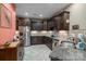Modern kitchen with dark wood cabinets and granite counters at 8176 Viscount Ct, Denver, NC 28037