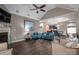Open living room with fireplace, view to kitchen and dining area at 8176 Viscount Ct, Denver, NC 28037