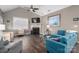 Spacious living room with vaulted ceiling, fireplace, and comfy seating at 8176 Viscount Ct, Denver, NC 28037