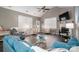 Bright living room with vaulted ceiling and hardwood floors at 8176 Viscount Ct, Denver, NC 28037