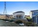 Large backyard with screened porch, playground, and partial view of neighboring houses at 10045 Carousel Corral Dr, Midland, NC 28107