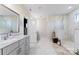 Bathroom with gray vanity and marble shower at 10045 Carousel Corral Dr, Midland, NC 28107