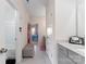 Clean bathroom with gray vanity and a view into a bedroom at 10045 Carousel Corral Dr, Midland, NC 28107