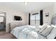 Cozy bedroom with a queen-size bed and a dresser at 10045 Carousel Corral Dr, Midland, NC 28107