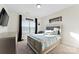 Serene bedroom with a queen-size bed and city view art at 10045 Carousel Corral Dr, Midland, NC 28107
