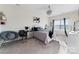 Stylish bedroom with a queen-size bed, vanity, and black accents at 10045 Carousel Corral Dr, Midland, NC 28107