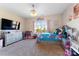 Charming bedroom with a full-size bed, dresser, and playful decor at 10045 Carousel Corral Dr, Midland, NC 28107