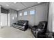Relaxing home theater room with leather seating at 10045 Carousel Corral Dr, Midland, NC 28107