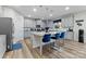 Open concept kitchen with island and stainless steel appliances at 10045 Carousel Corral Dr, Midland, NC 28107