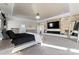 Main bedroom featuring a fireplace and large TV at 10045 Carousel Corral Dr, Midland, NC 28107