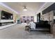 Luxurious main bedroom with sitting area and fireplace at 10045 Carousel Corral Dr, Midland, NC 28107