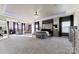 Spacious main bedroom with sitting area and large TV at 10045 Carousel Corral Dr, Midland, NC 28107