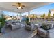 Relaxing screened porch with comfortable seating and view of the backyard at 10045 Carousel Corral Dr, Midland, NC 28107