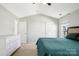 Vaulted ceiling bedroom featuring carpet floors, a double door closet and windows at 10430 Samuels Way Dr, Huntersville, NC 28078