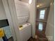 Stackable washer and dryer in small laundry room at 107 Meadow Ne Ave # 7, Concord, NC 28025