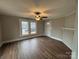 Bright living room featuring hardwood floors and a fireplace at 107 Meadow Ne Ave # 7, Concord, NC 28025