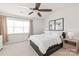 Spacious bedroom with ceiling fan and large window at 12307 Bluestem Ln, Charlotte, NC 28277