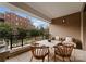 Spacious outdoor balcony featuring dining and lounging areas with city views at 130 Cherokee Rd # 104, Charlotte, NC 28207