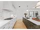 Bright, spacious kitchen with a large island and white cabinetry, ideal for modern living at 130 Cherokee Rd # 104, Charlotte, NC 28207