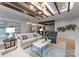 Beautiful living room featuring a stylish chandelier, comfortable seating, and elegant decor at 130 Cherokee Rd # 104, Charlotte, NC 28207