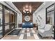 Lobby featuring elegant furniture, decorative lighting, and access to resident services at 130 Cherokee Rd # 104, Charlotte, NC 28207
