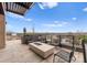 Inviting roof deck with a fire pit, comfortable seating, and skyline views at 130 Cherokee Rd # 104, Charlotte, NC 28207