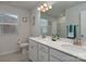Well-lit bathroom featuring a double sink vanity and a combination shower and bathtub at 1342 Galloway Rd # 132, Charlotte, NC 28262