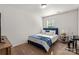 A blue themed bedroom with natural light and cozy decor at 1342 Galloway Rd # 132, Charlotte, NC 28262