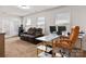 Upstairs bonus room with comfortable seating and a desk area, perfect for work or relaxation at 1342 Galloway Rd # 132, Charlotte, NC 28262